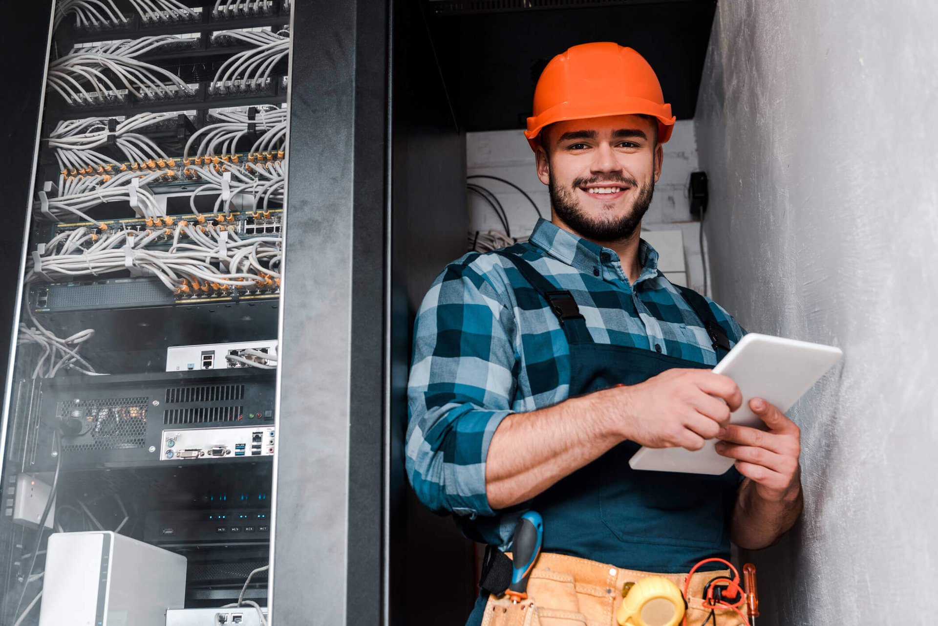 Man in hard helmet working in industry